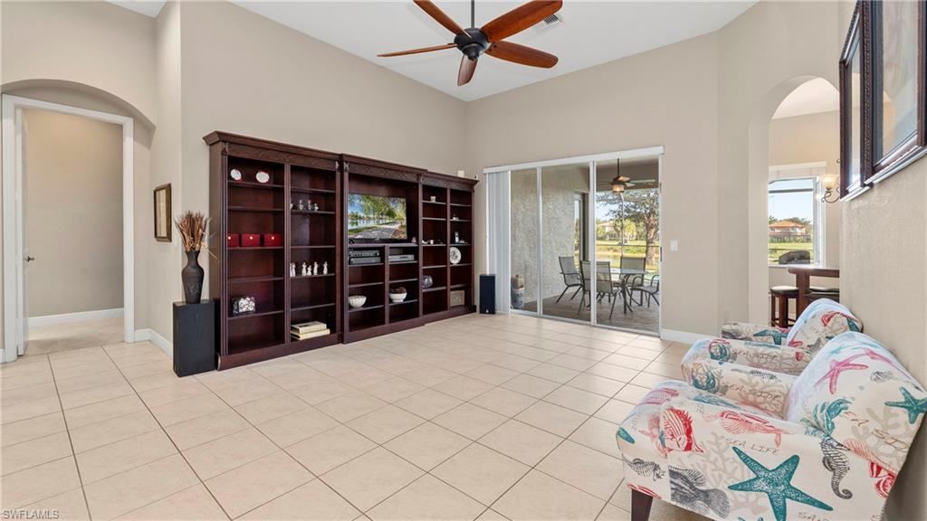 1730 Sarazen Place Naples, FL 34120 - Photo 11 of 50 a bedroom with a large bed and walk in closet