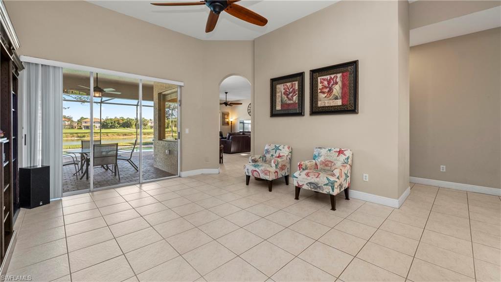 1730 Sarazen Place Naples, FL 34120 - Photo 12 of 50 a living room with furniture