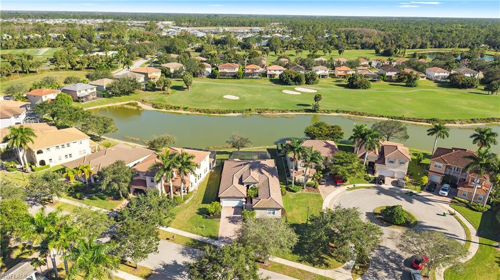 1730 Sarazen Place Naples, FL 34120 - Photo 42 of 50 an aerial view of residential houses with outdoor space
