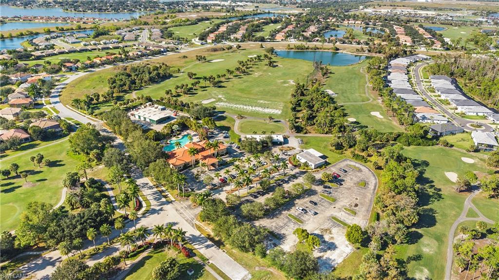 1730 Sarazen Place Naples, FL 34120 - Photo 44 of 50 an aerial view of residential houses with outdoor space