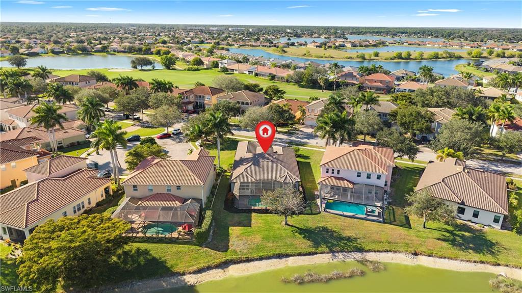 1730 Sarazen Place Naples, FL 34120 - Photo 6 of 50 an aerial view of residential houses with outdoor space