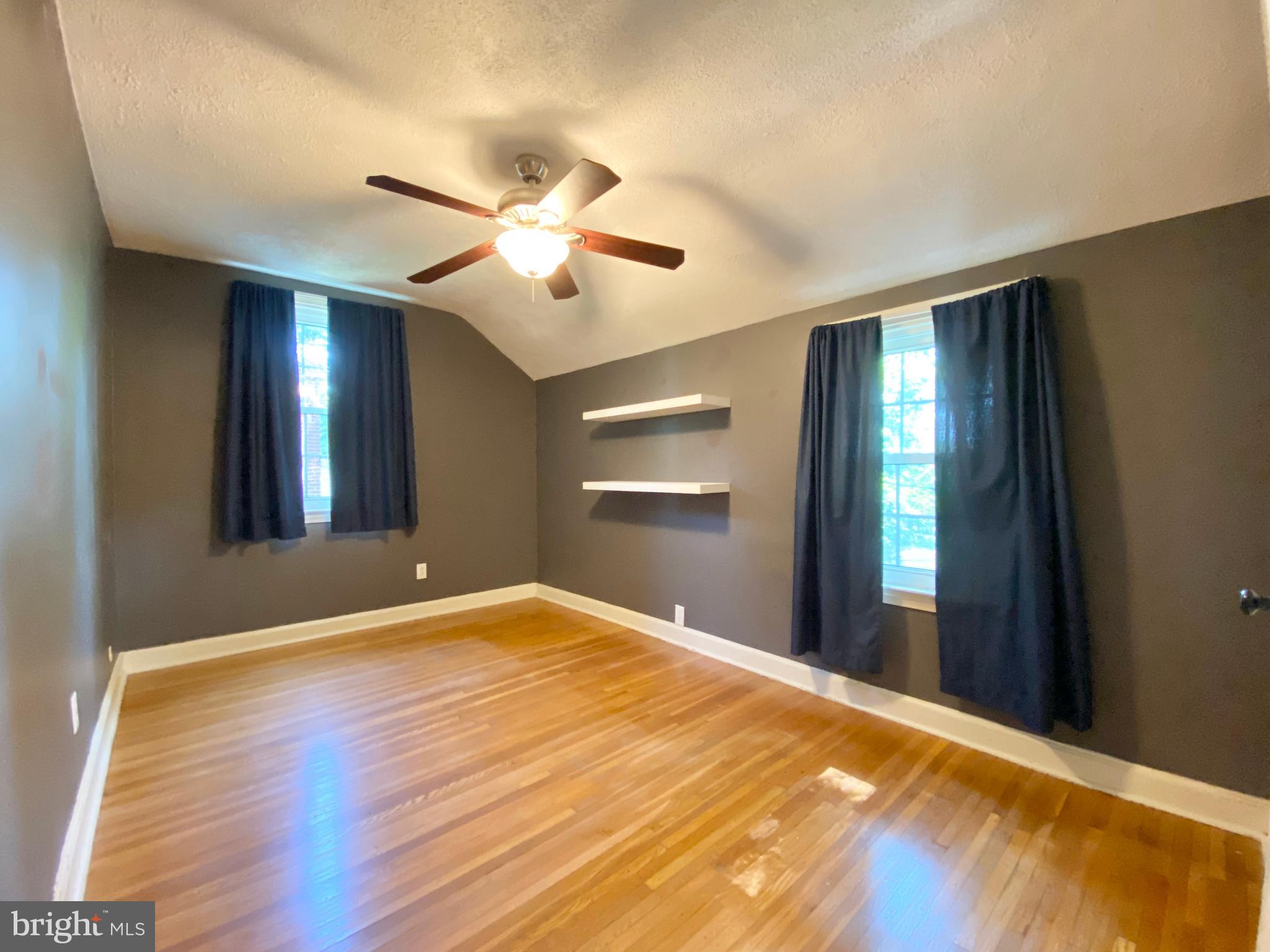26 Hurst Road Wilmington, DE 19803 - Photo 25 of 74 a view of an empty room with a ceiling fan