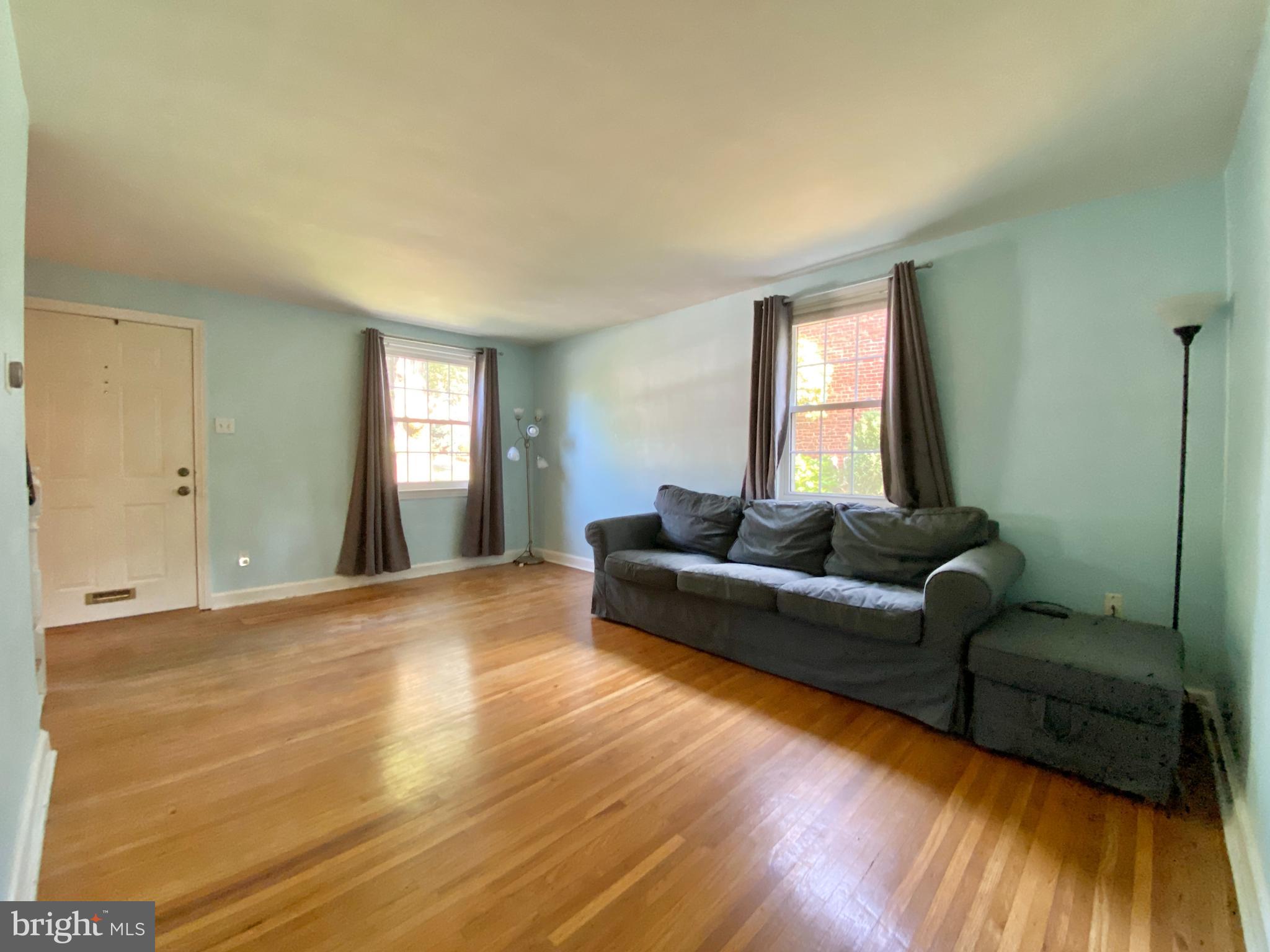 26 Hurst Road Wilmington, DE 19803 - Photo 48 of 74 a living room with furniture and a flat screen tv