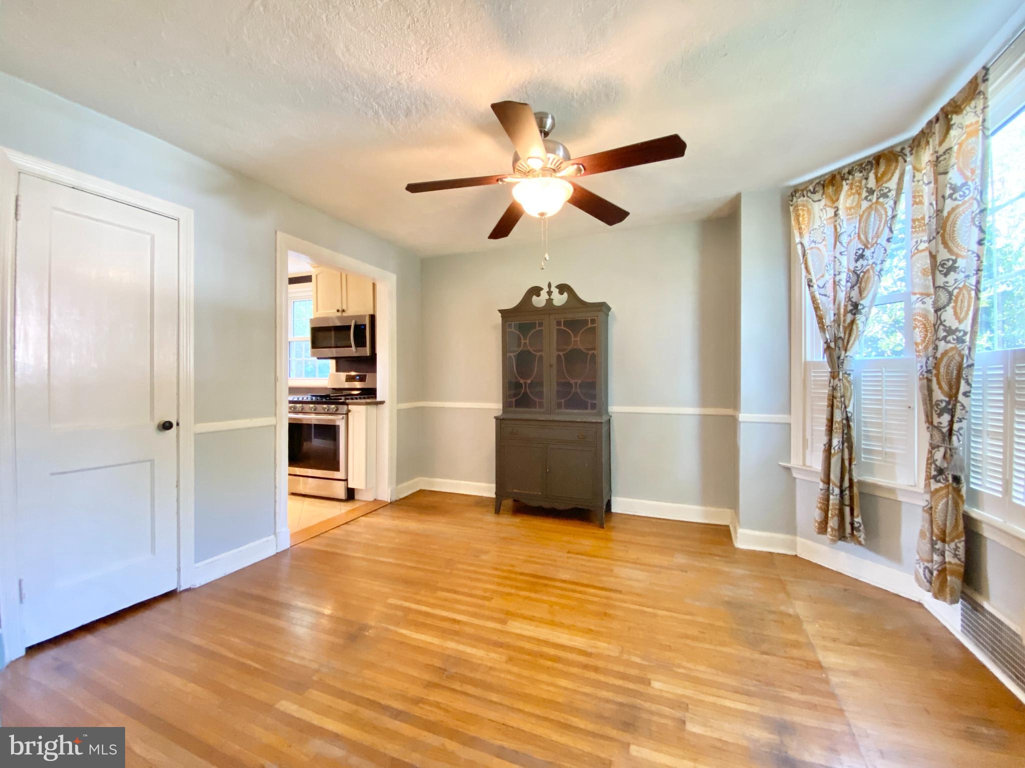 26 Hurst Road Wilmington, DE 19803 - Photo 49 of 74 a view of kitchen with wooden floor and window