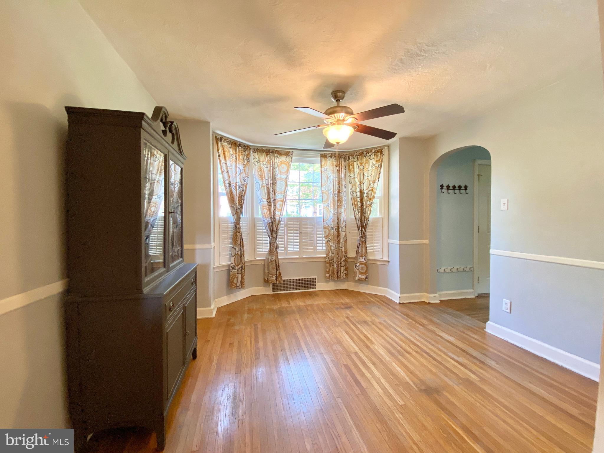 26 Hurst Road Wilmington, DE 19803 - Photo 51 of 74 a view of an empty room with wooden floor and a window