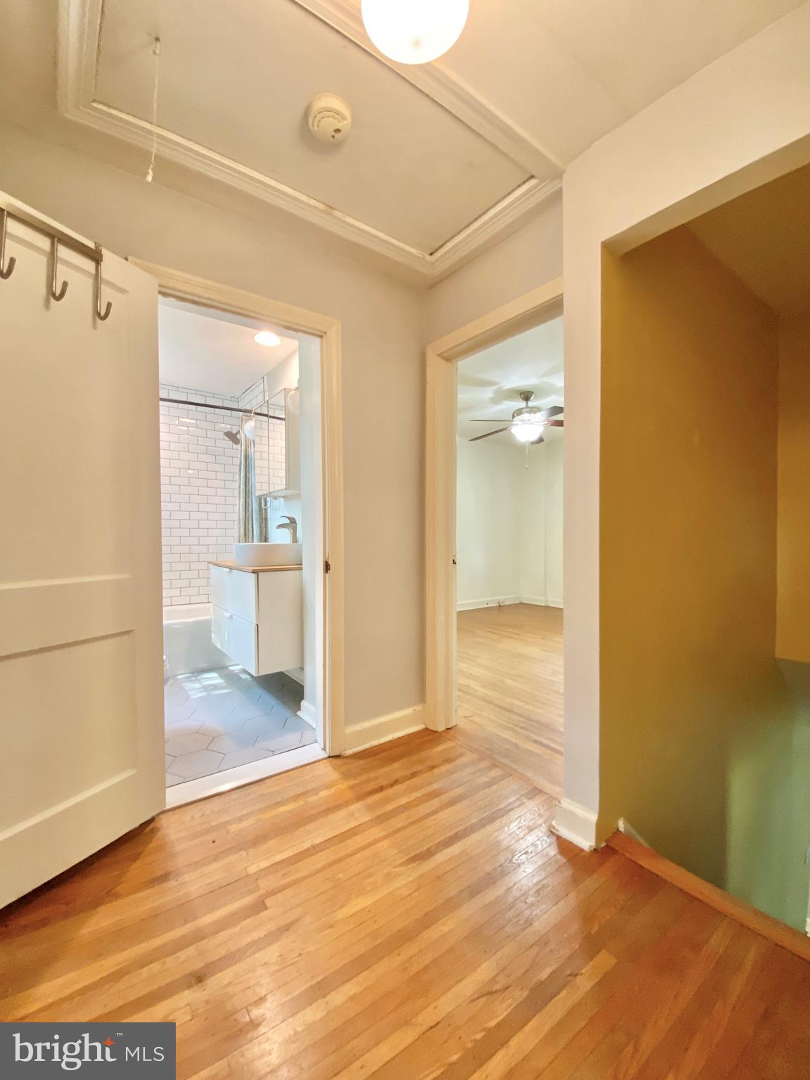 26 Hurst Road Wilmington, DE 19803 - Photo 67 of 74 a view of a room with wooden floor and a bathroom