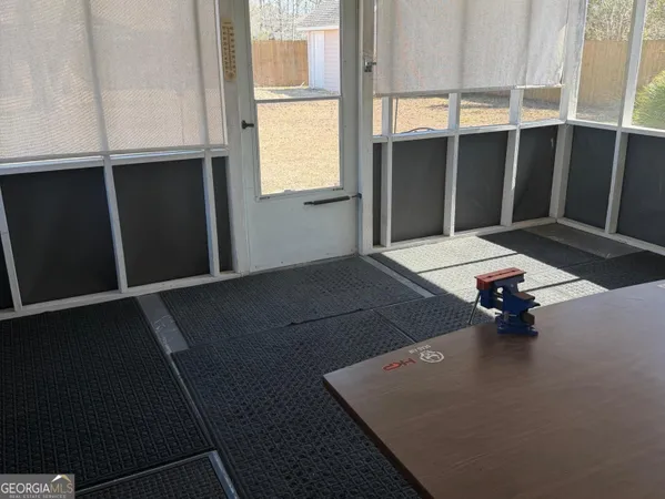 a room with table and window