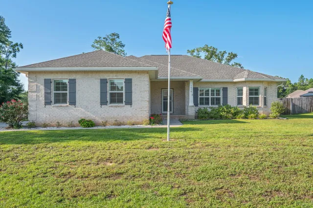 a house view with a garden space
