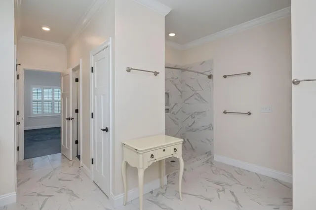a bathroom with a shower and a sink