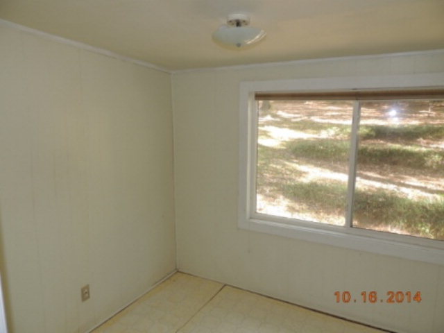 2646 Powersville Road Byron, GA 31008 - Photo 7 of 8 a view of empty room with window
