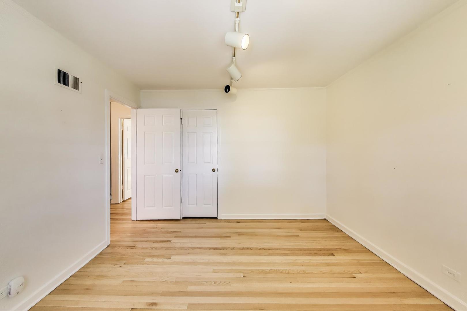 419 3rd Street Wilmette, IL 60091 - Photo 10 of 16 a view of empty room with wooden floor