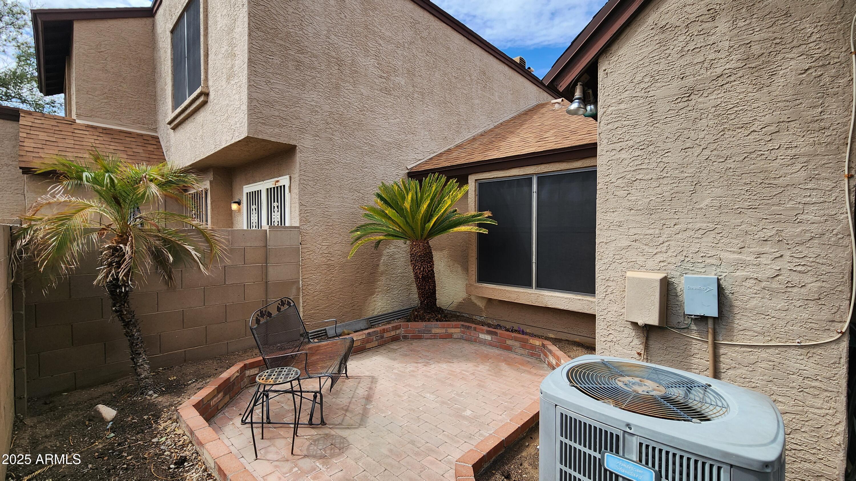 7977 West Wacker Road, Unit 226 Peoria, AZ 85381 - Photo 15 of 19 a front view of a house with balcony