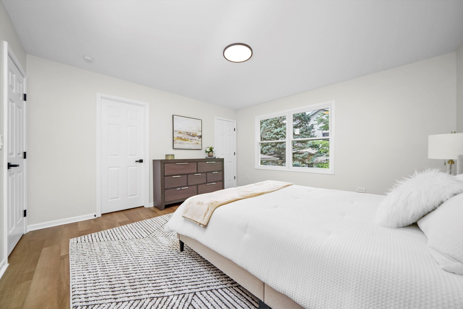 1668 Hidden Valley Drive Bolingbrook, IL 60490 - Photo 24 of 43 a bedroom with a bed and a window