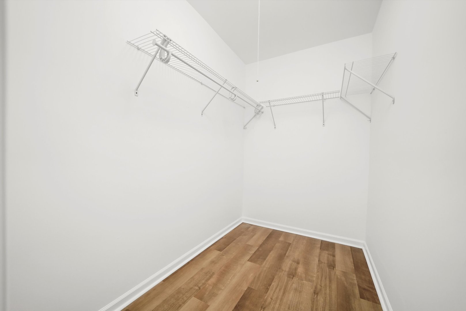 1668 Hidden Valley Drive Bolingbrook, IL 60490 - Photo 25 of 43 a view of a room with racks on the wall