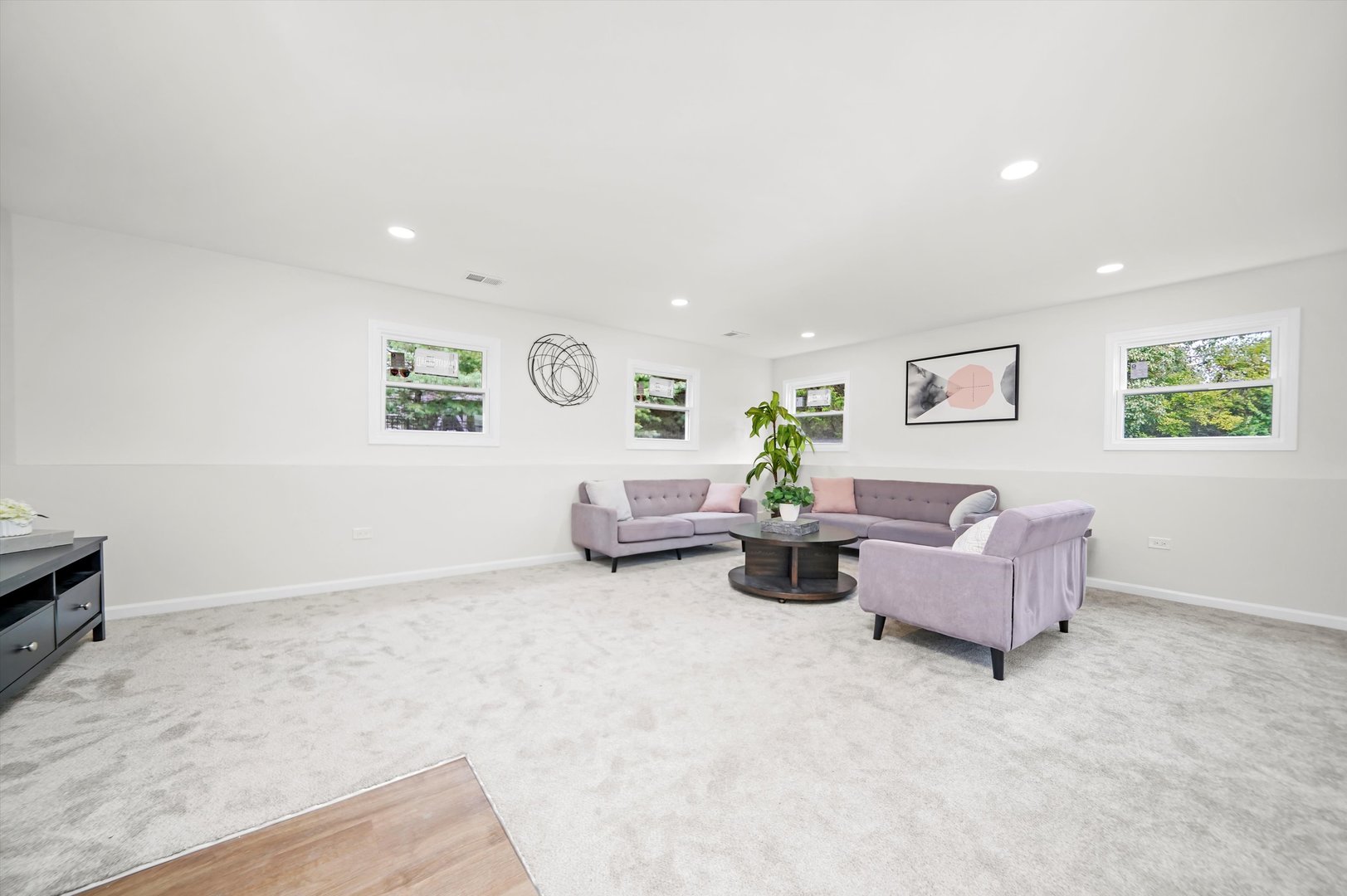 1668 Hidden Valley Drive Bolingbrook, IL 60490 - Photo 30 of 43 a living room with furniture and a window