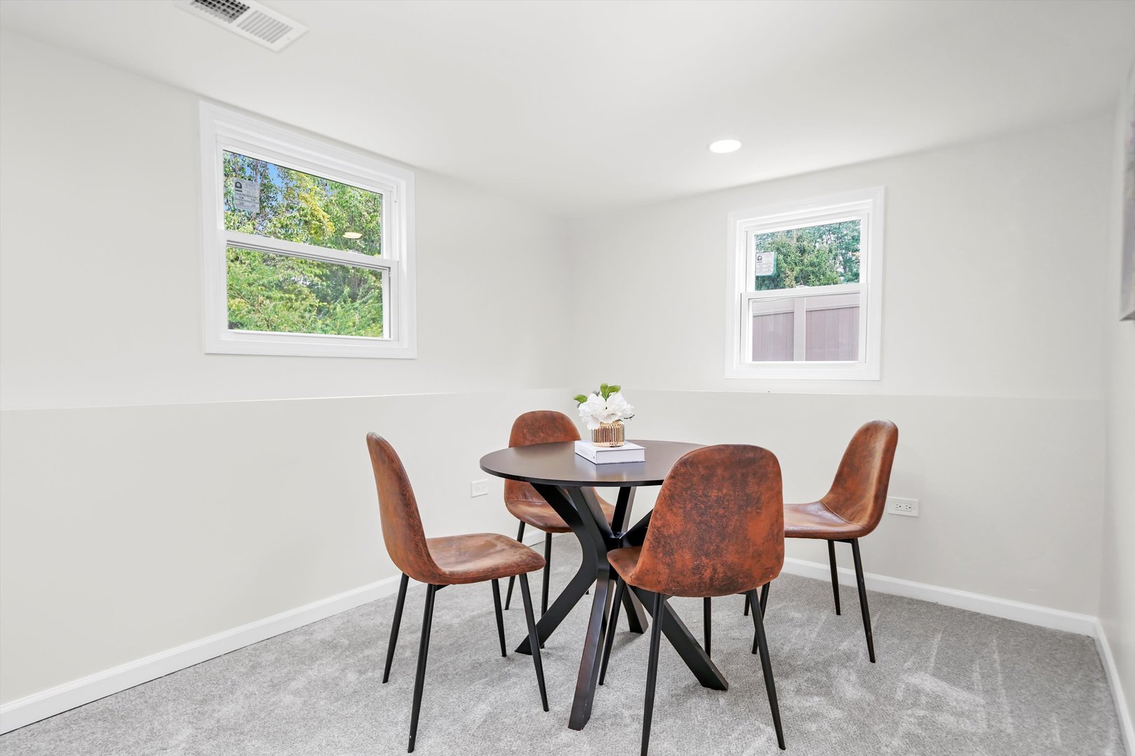 1668 Hidden Valley Drive Bolingbrook, IL 60490 - Photo 31 of 43 a view of a dining room with furniture and window