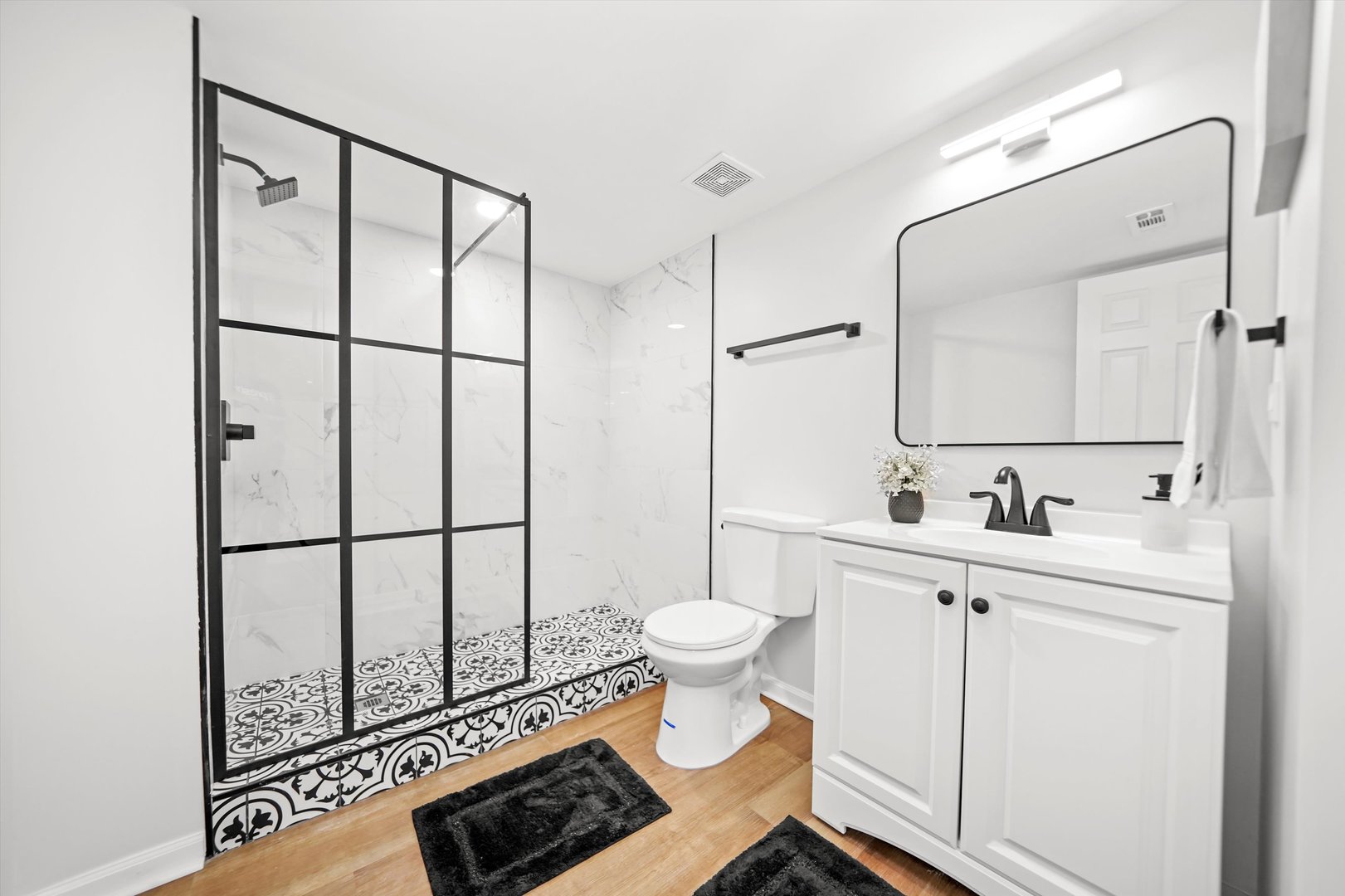 1668 Hidden Valley Drive Bolingbrook, IL 60490 - Photo 32 of 43 a bathroom with a sink toilet and a mirror