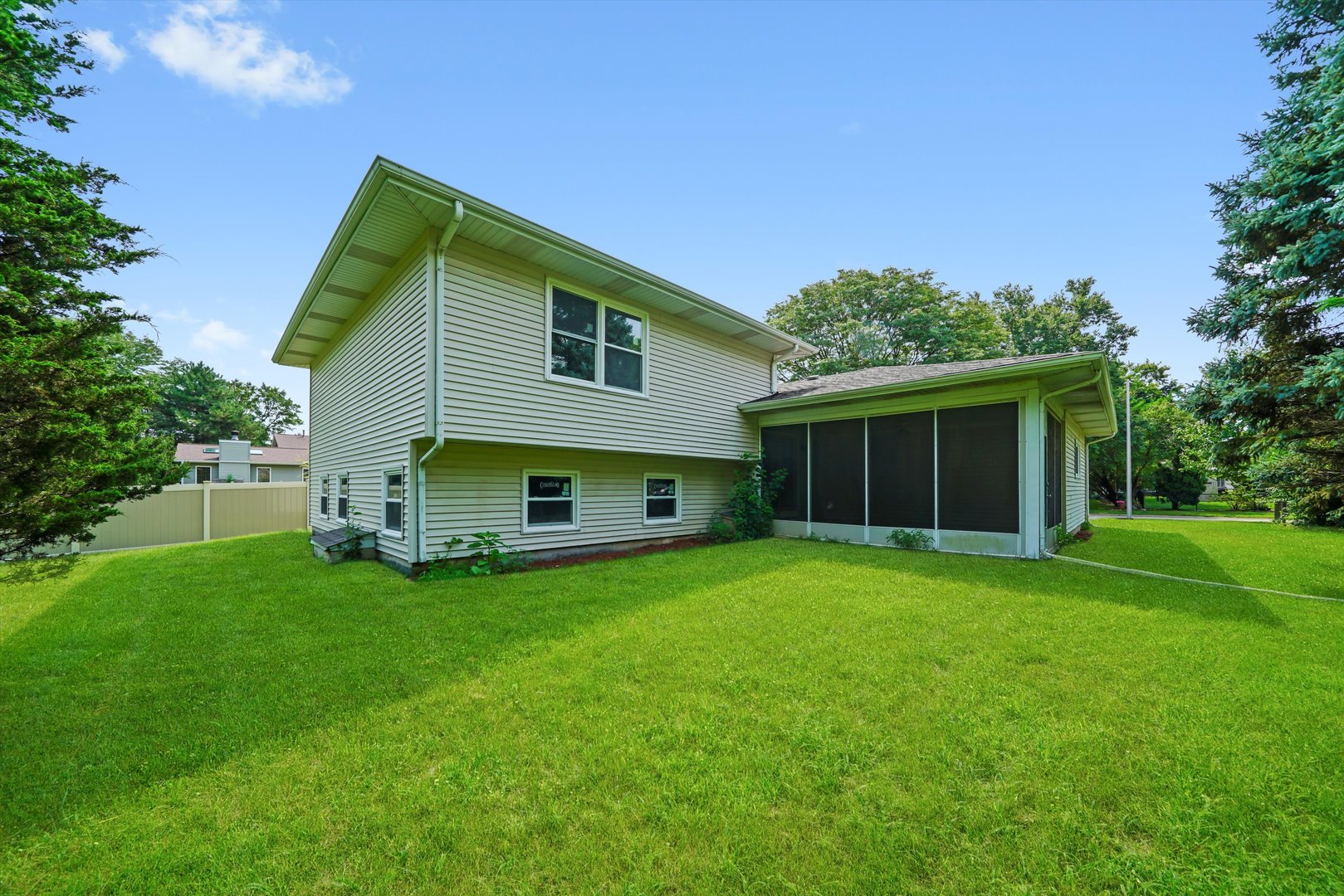 1668 Hidden Valley Drive Bolingbrook, IL 60490 - Photo 41 of 43 a view of a house with a backyard