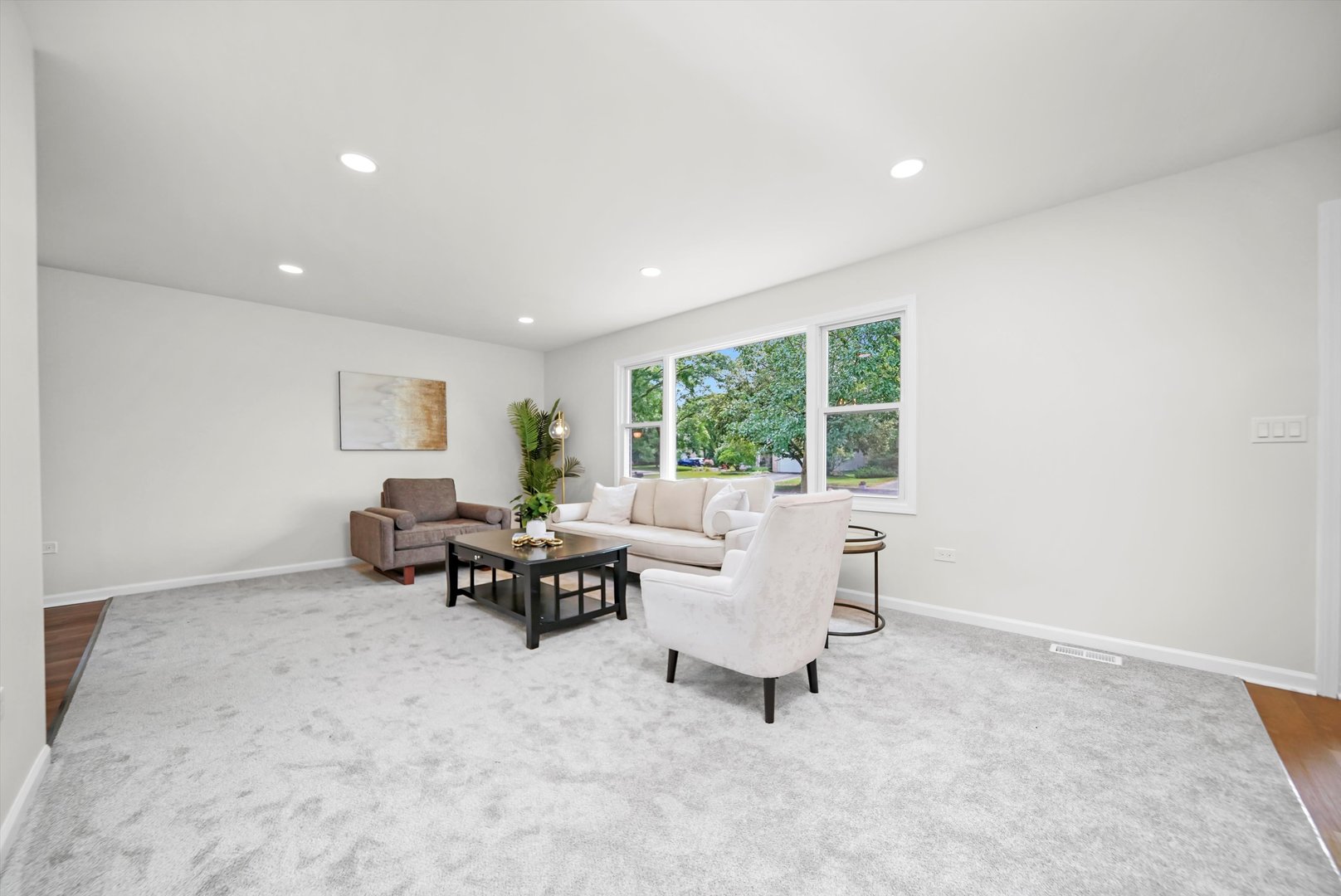 1668 Hidden Valley Drive Bolingbrook, IL 60490 - Photo 8 of 43 a living room with furniture and a window