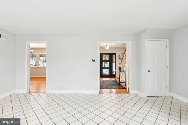 a view of an empty room and window