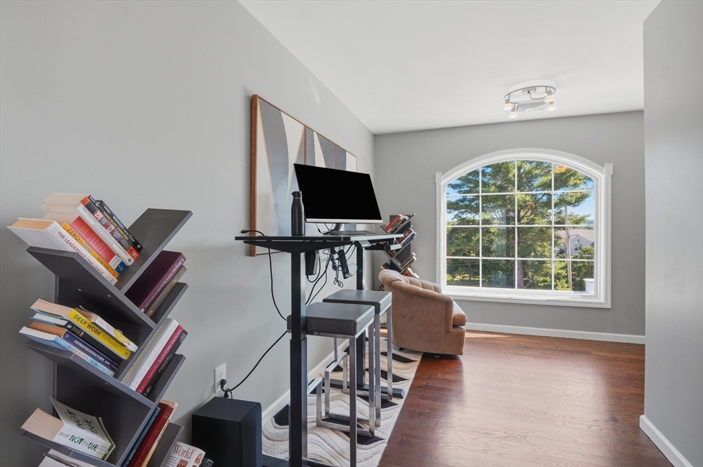 112 Pineland Avenue Worcester, MA 01604 - Photo 20 of 38 a living room with furniture and a flat screen tv