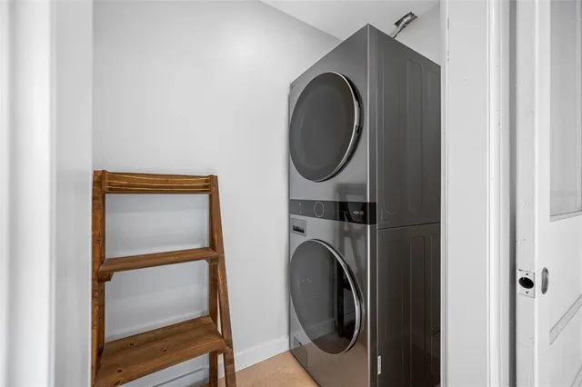 a close view of utility room with washer and dryer