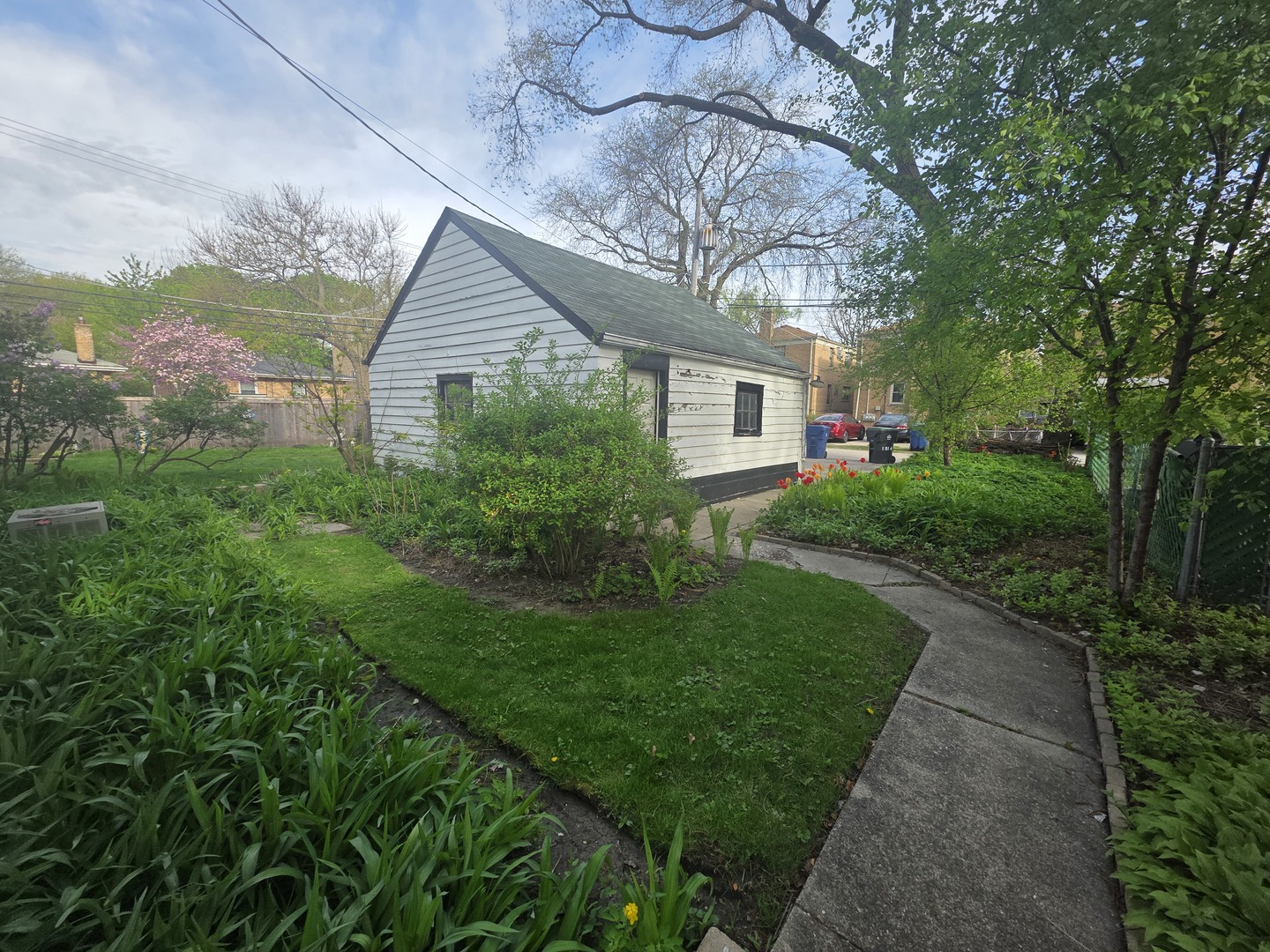 1815 Cleveland Street Evanston, IL 60202 - Photo 18 of 22 a front view of house with yard and green space