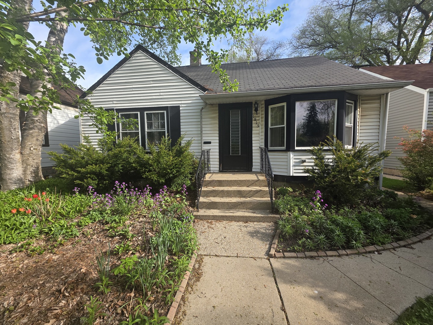 1815 Cleveland Street Evanston, IL 60202 - Photo 2 of 22 a front view of a house with garden