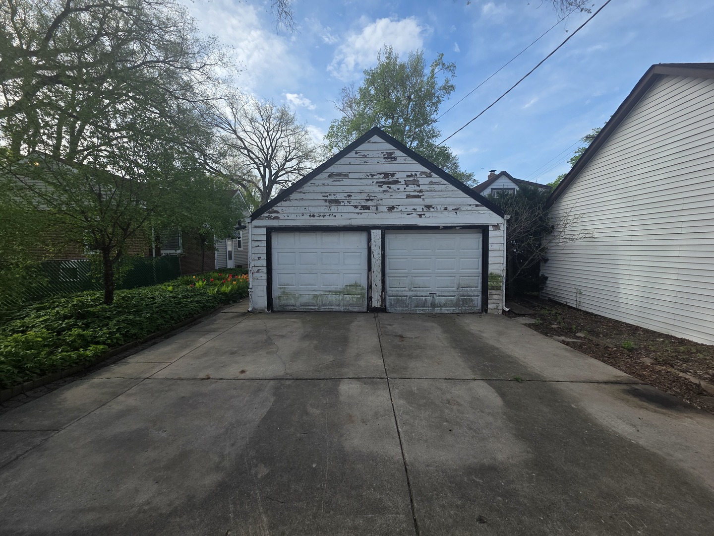 1815 Cleveland Street Evanston, IL 60202 - Photo 22 of 22 a front view of a house with a yard and garage