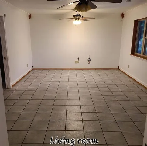 a view of a livingroom and an empty space