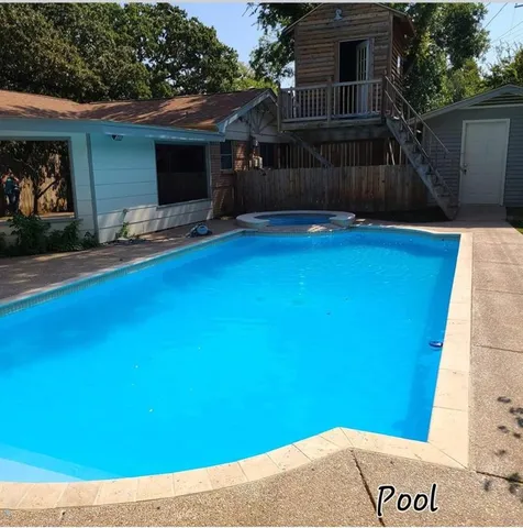 a view of backyard with furniture