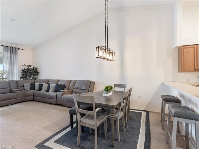 a view of a livingroom with furniture and a table