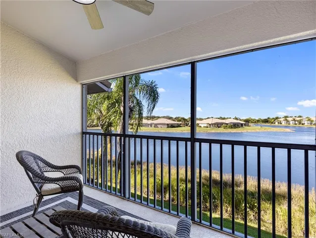 a view of balcony with furniture