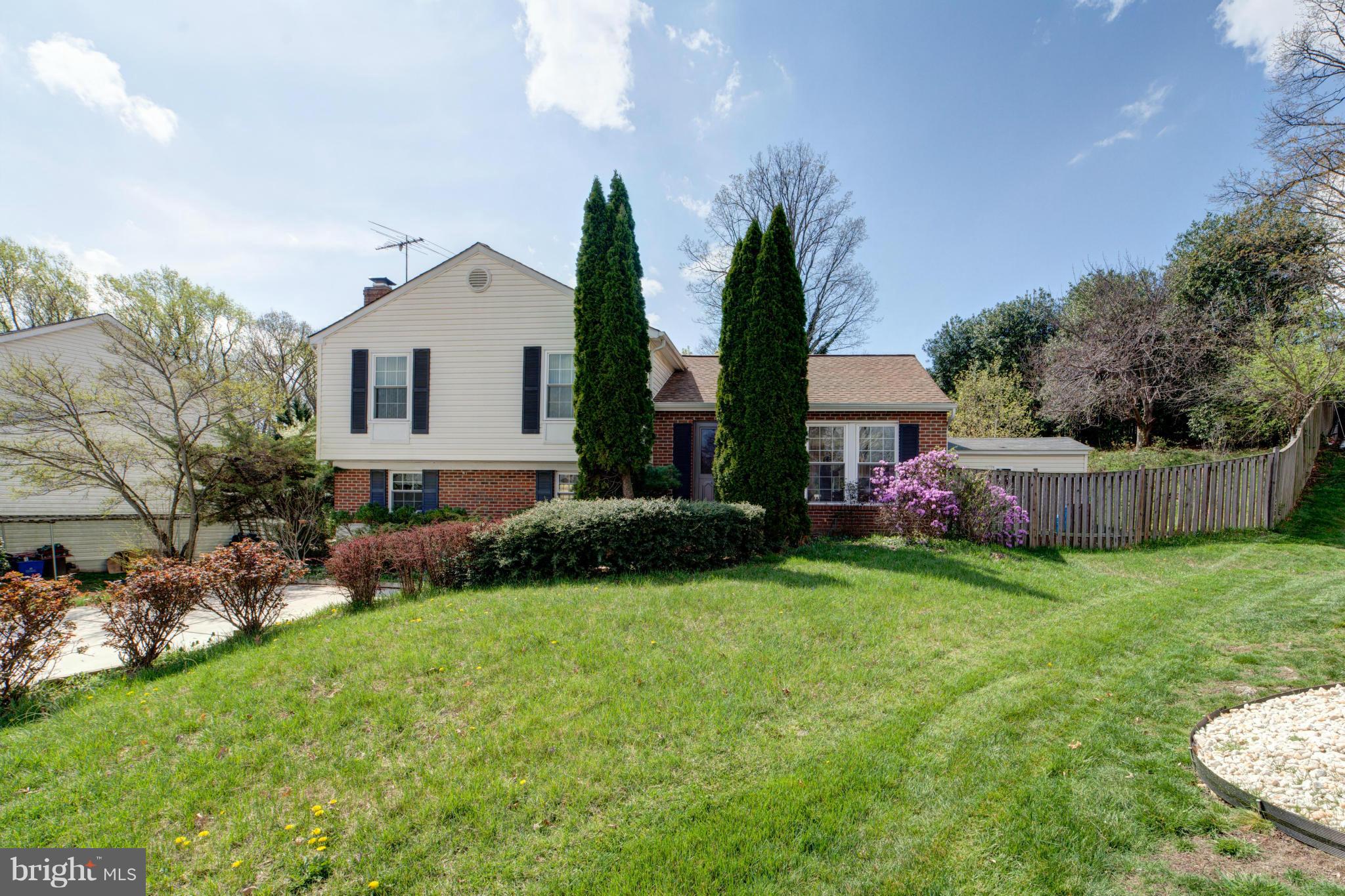3116 Beethoven Way Silver Spring, MD 20904 - Photo 2 of 30 a front view of a house with garden