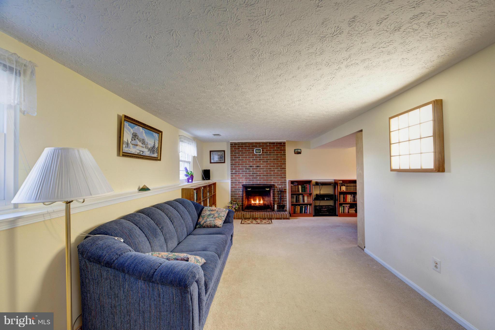 3116 Beethoven Way Silver Spring, MD 20904 - Photo 15 of 30 a living room with furniture and a lamp