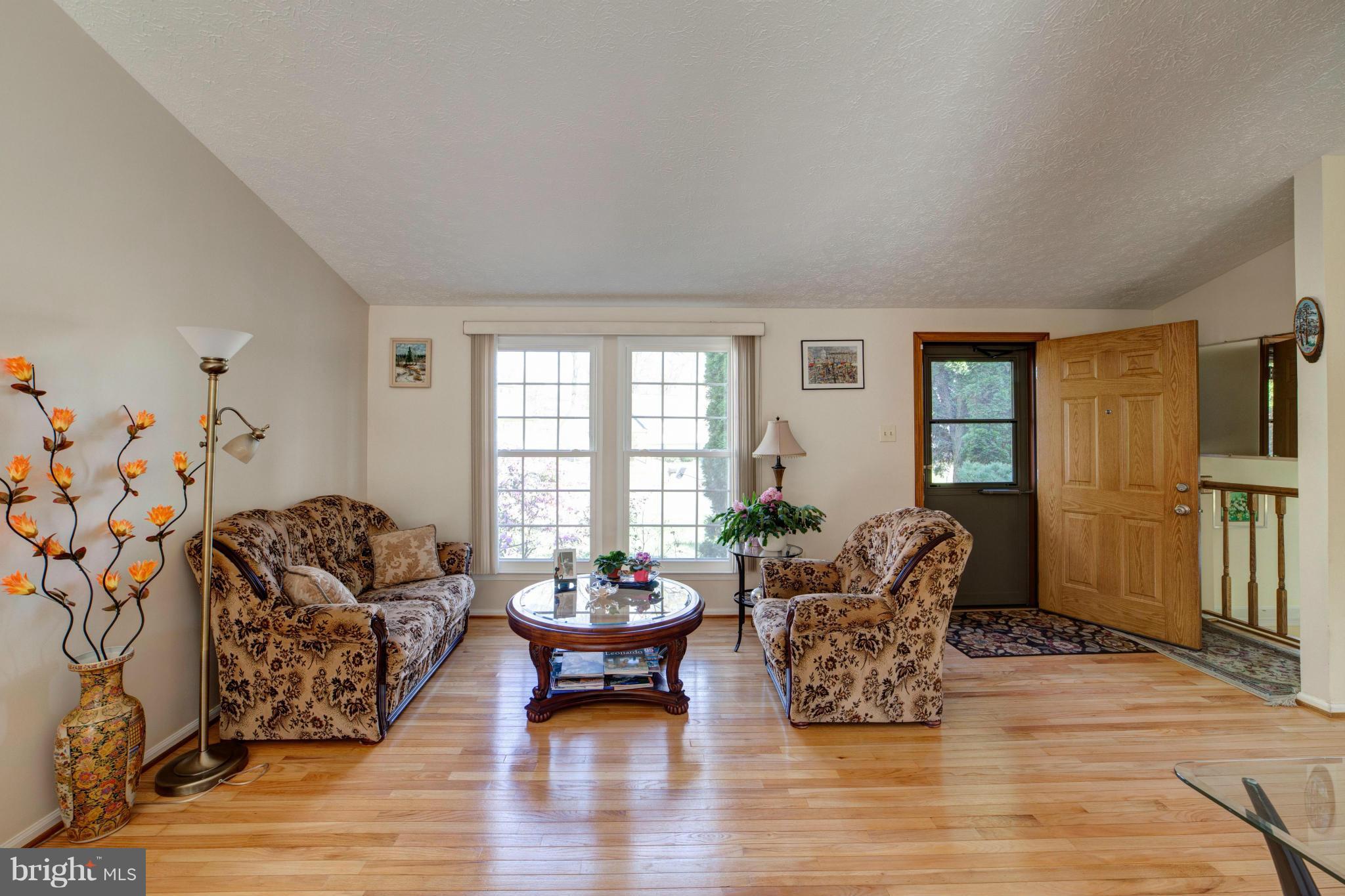 3116 Beethoven Way Silver Spring, MD 20904 - Photo 10 of 30 a living room with furniture and wooden floor