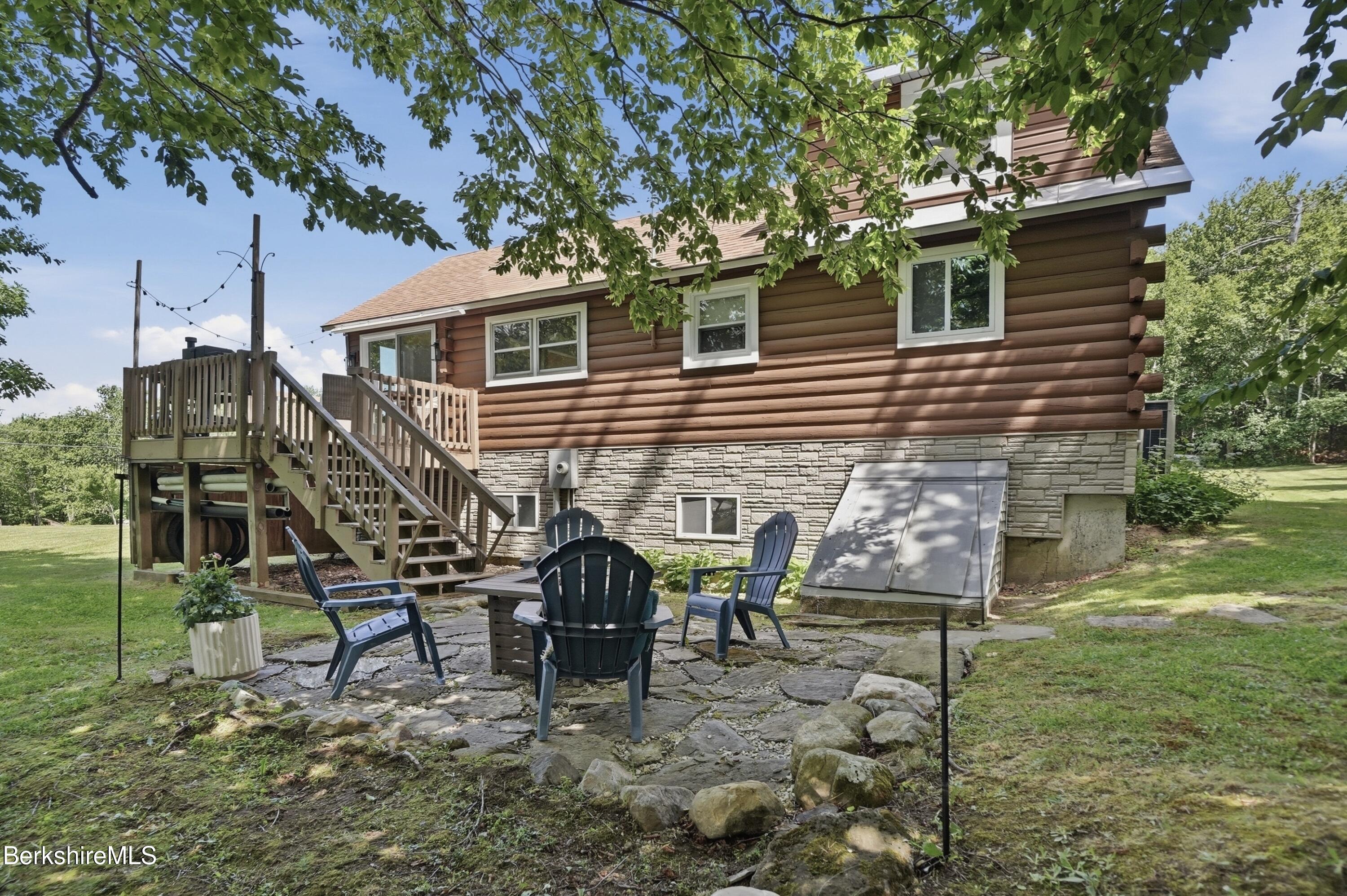 4 David Drive Peru, MA 01235 - Photo 32 of 44 a view of a chairs and table in backyard of the house