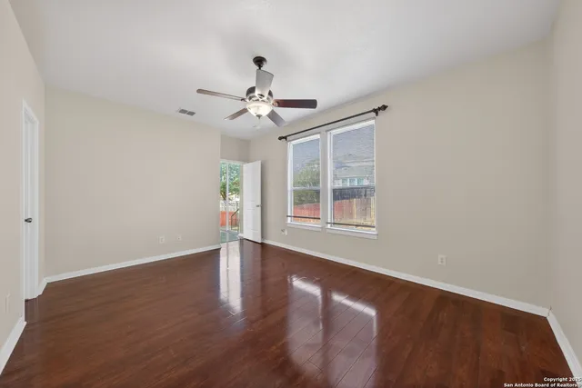 a bathroom with a sink double vanity and a mirror