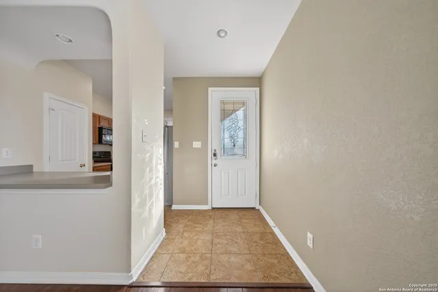 a large kitchen with stainless steel appliances