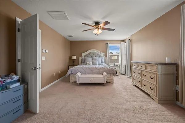 a bedroom with a bed and closet