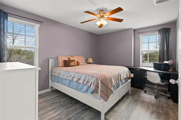 a view of hallway with chandelier