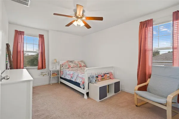 a utility room with dryer washer and closet