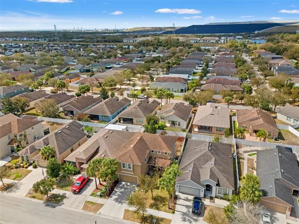 a view of a swimming pool with a yard