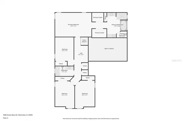 a living room with furniture and a book shelf