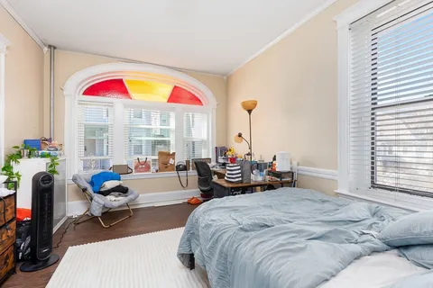 a view of a livingroom with furniture and windows