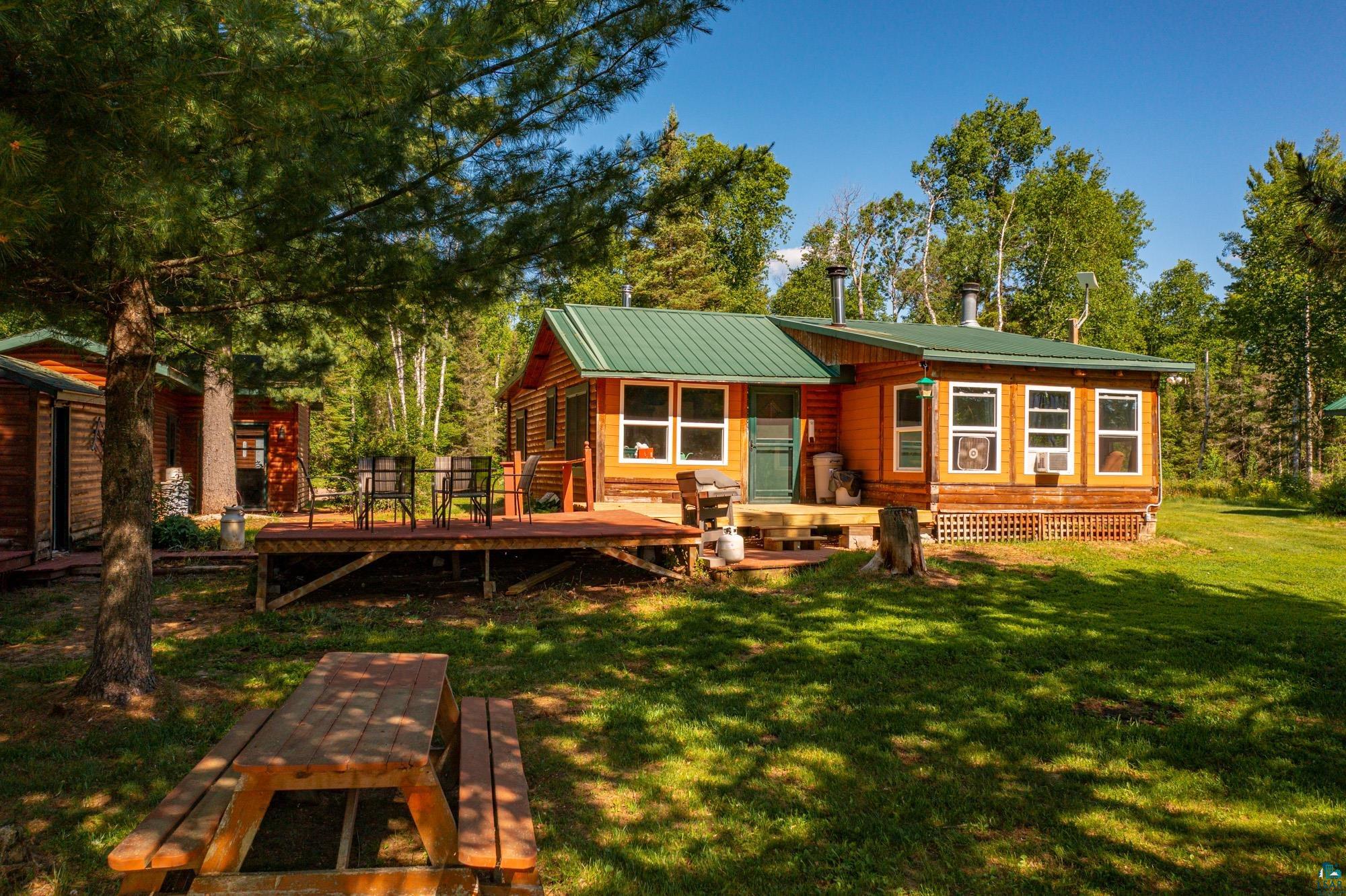 3420 Dewees Road Babbitt, MN 55706 - Photo 2 of 58 Front view of structures facing the lake.