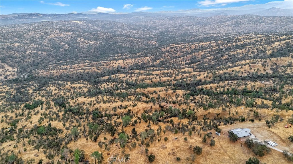 37749 Misty Ridge Road Raymond, CA 93653 - Photo 5 of 23 an aerial view of residential houses with outdoor space