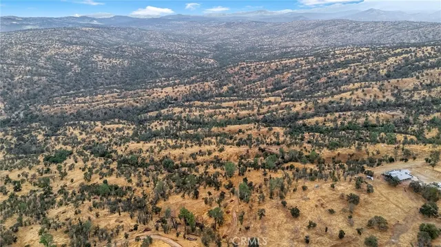 an aerial view of residential house and space