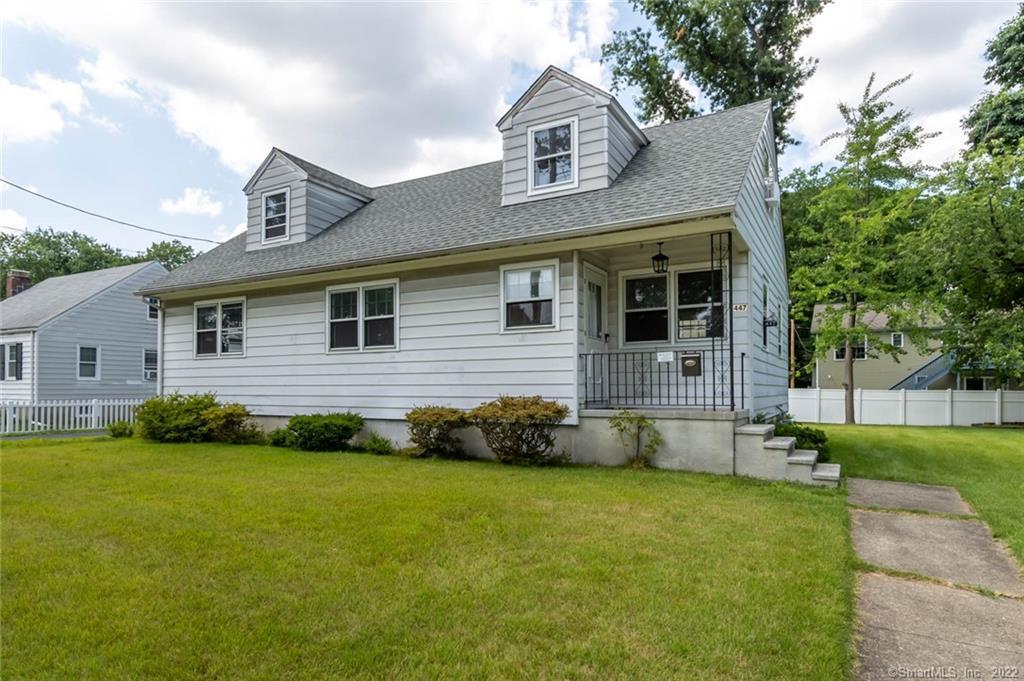 447 Meadowside Road Milford, CT 06460 - Photo 1 of 1 a front view of a house with a yard
