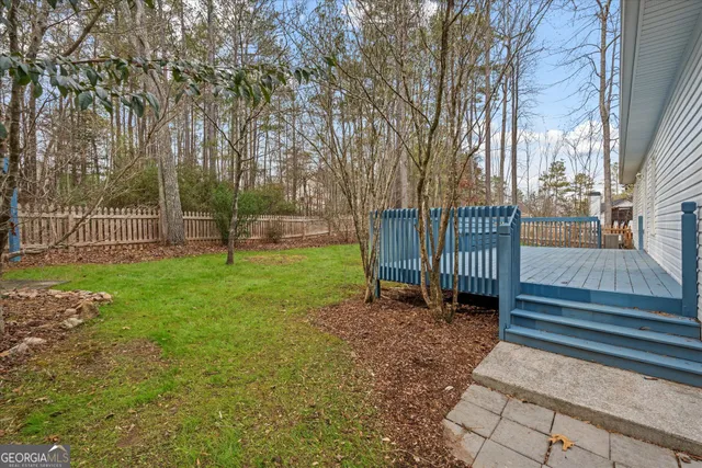 a view of a backyard with a garden